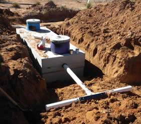 Installation of new 1,000-gallon concrete septic tank (2/14/11) 